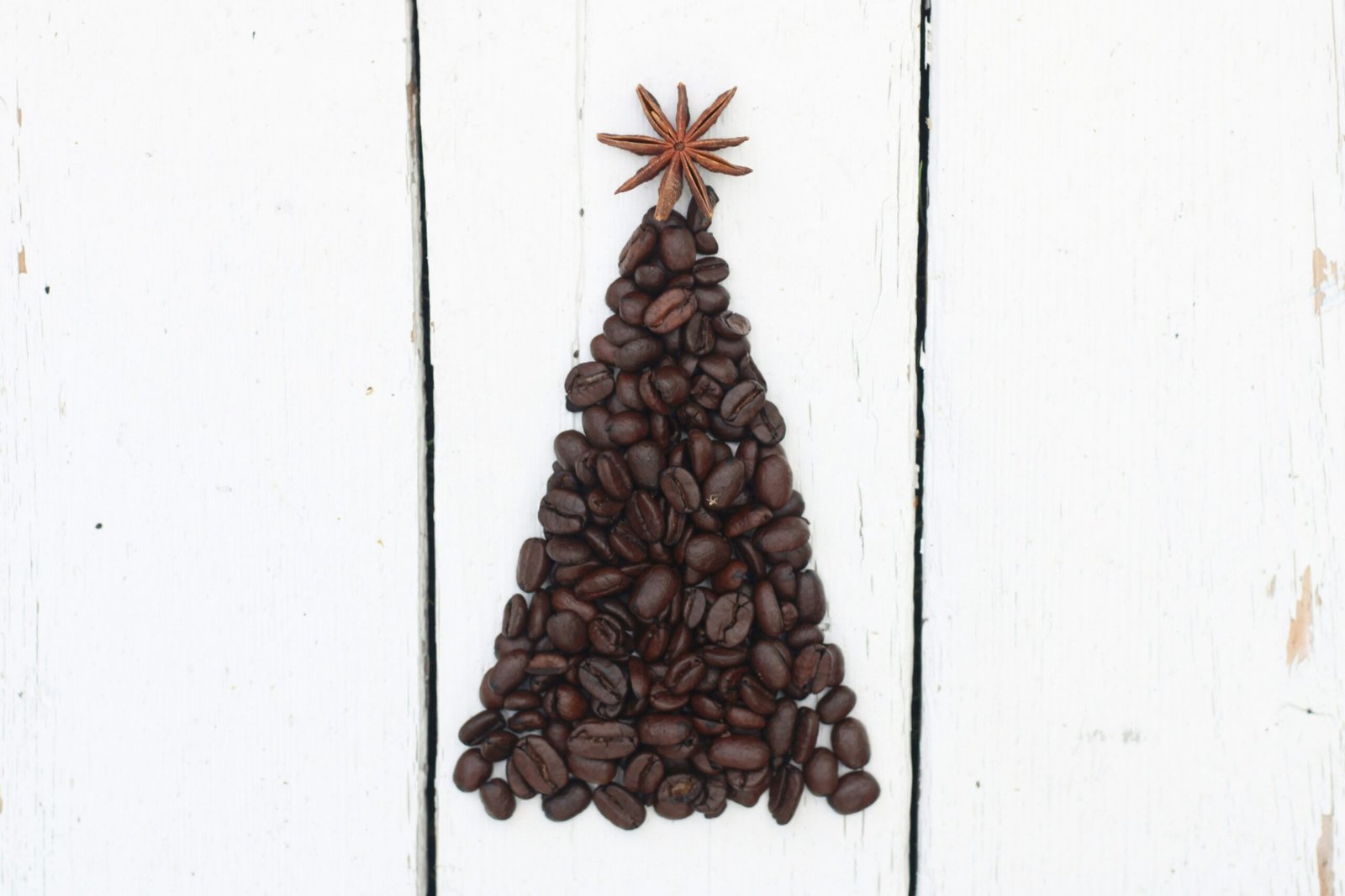 a christmas tree made out of coffee beans